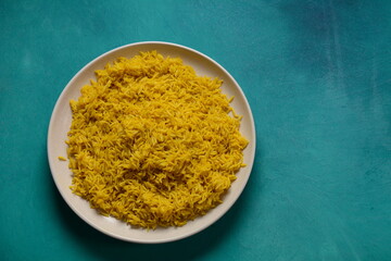 Yellow wild rice cooked with curcuma turmeric spice