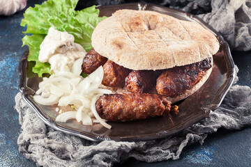 Cevapcici or cevapi served with lepinja bread