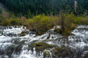 The small waterfalls at pearl beach, in Jiuzhai Valley Park, Sichuan, China.