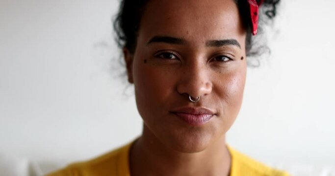 Young black woman smiling at camera