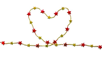Garland with stars laid out in the form of a heart on a white background