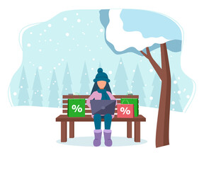 Happy young woman with winter sale celebrating her purchases, with her gift bags containing discounted merchandise