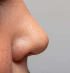 children's nose in profile on a light background