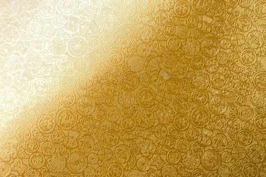 Abstract shiny yellow paper with Chinese pattern background, web or card background idea