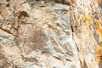 Stone surface texture in beige yellow gray colors