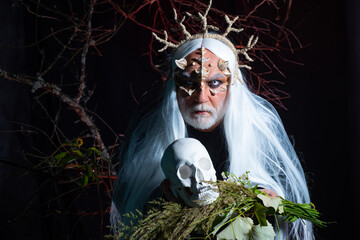 Mysterious warrior enchanted to have thorns on his face. Alien with dragon skin and grey beard....