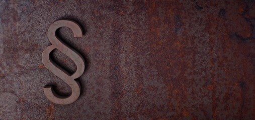 Paragraph / section sign on grunge background. Panoramic image with copyspace.	