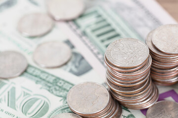 Dollar bills and dollar coins