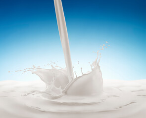 Milk pouring splashing with blue background