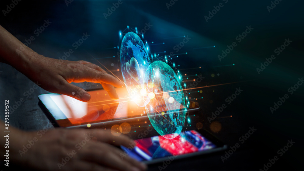 Fototapete Businessman using tablet and smartphone on colorful global network connection and data exchanges on dark background. Business and communication technology.