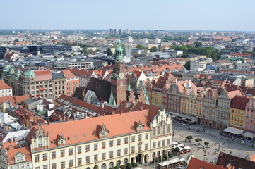 Fototapeta na wymiar Aerial view of panorama of old town in the city of Wroclaw or Breslau in southern Poland in summer with red tile roofs