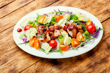 Salad with vegetables and meat steak