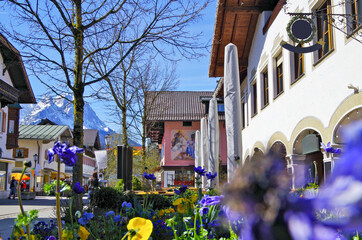 View into center of Garmisch-partenkirchen town with pedestrian zone and picturesque Bavarian style...