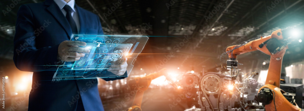 Poster Engineer check and control welding robotics automatic arms machine in factory automotive industrial with monitoring system software on virtual interface. Digital manufacturing operation. Industry 4.0