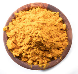 Turmeric powder or curcuma powder in wooden bowl isolated on white background.