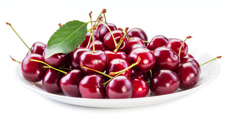 Sweet cherries on white plate over white background.