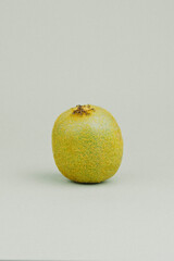 Kiwi fruit close-up on olive background. Healthy food concept