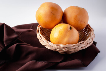  Pear fruit  in wicker basket