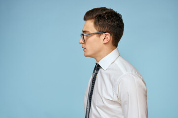 Business man white shirt tie glasses self-confidence official blue background