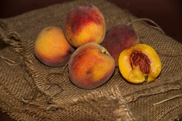 Fototapeta na wymiar peaches on a wooden table