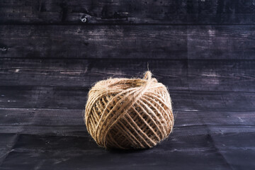 ball of thread on a dark background