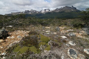 Near the town of Ushuaia is Laguna Esmeralda. In the wild mountains of Sierra Alvear. Before the lagoon we can see the snow covered mountain Cerro Colorado.Argentina.South America. Tierra del Fuego.