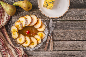 Sweet dessert with pears and dor blue cheese. Top view. Copy space