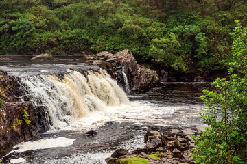 Fototapeta na wymiar Beautiful Aasleagh water fall in County Mayo, Ireland, Nobody, Popular tourist attraction.