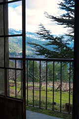 Snow on the top of Troodos mountains - beautiful window view of mountain landscape on Cyprus