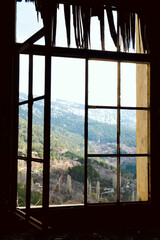 Snow on the top of Troodos mountains - beautiful window view of mountain landscape on Cyprus