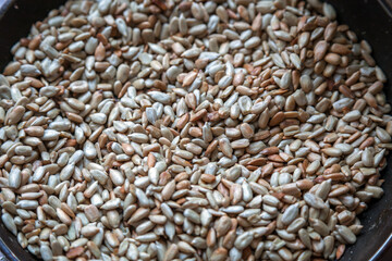 Fried seeds in a frying pan