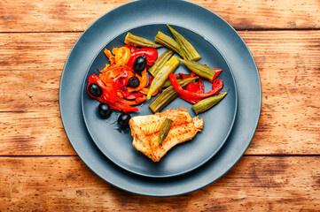 Baked fish with vegetables