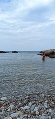 Fototapeta na wymiar beautiful woman in a mediterannean bay