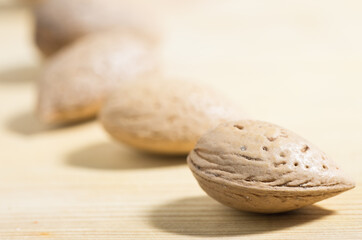 Close-up of almonds on a wooden tabletop