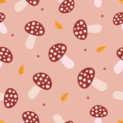 Flat brown mushrooms, calm dots and orange leaves on light pink background. Seamless autumn doodle pattern. Suitable for wrapping, textile.