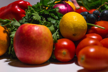 Background of vegetables different fresh farm vegetables. Food or Healthy diet concept. Composition with assorted raw organic vegetables. detox diet: lemon, tomato, pepper, cauliflower, apple, grape
