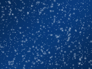 雪の降る寒い夜空