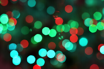 Blurred of Christmas Lights Bokeh background Hanging in a line From the roof inside the Supermarket in Thailand.