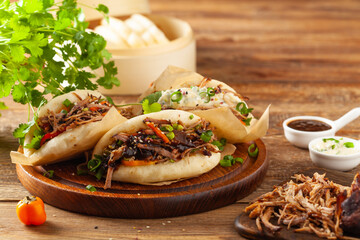 Pulled pork in a Bao Bao roll. Top view.
