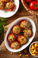 Baked stuffed tomatoes. Stuffed with chanterelles. Top view of the dish.