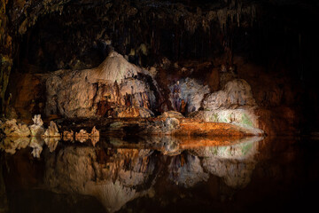 Cave with stalactites colourful