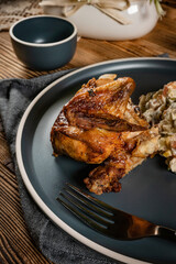 Roast chicken served with russian traditional salad.