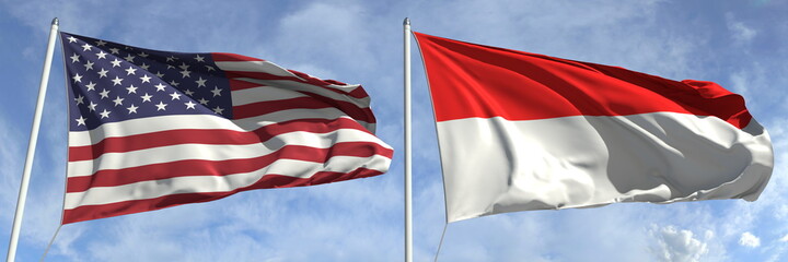 Fototapeta na wymiar Flying flags of the USA and Indonesia on sky background, 3d rendering