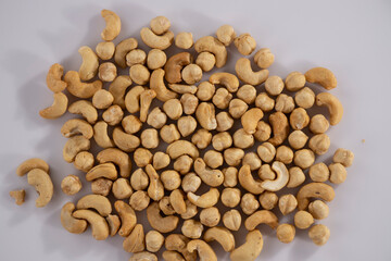 healthy hazelnuts and cashews on white background