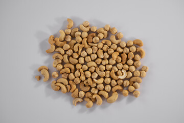 healthy hazelnuts and cashews on white background