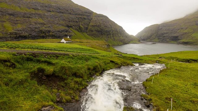Time Lapse from Saksun and Saksun Church in the Faroe Islands. The village lies in the bottom of what used to be an inlet of the sea, surrounded by high mountains.
