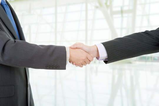 Business men hand shake