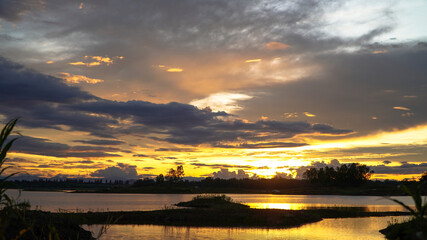 Obraz premium Golden sunbeam in the lake in the evening nature,Landscape 