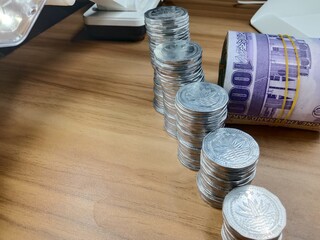 bangladeshi bank note and coin