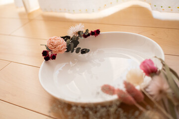 A bundle of dried flowers and preserved flowers decorated